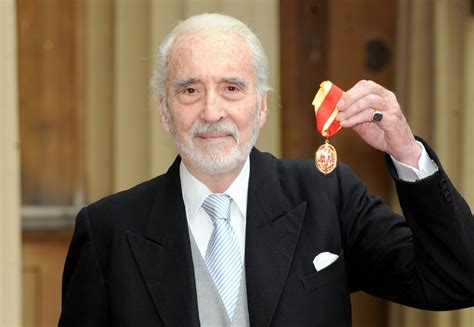 Christopher Lee Showing A Medal Christopher Lee Wallpaper 1920x1328