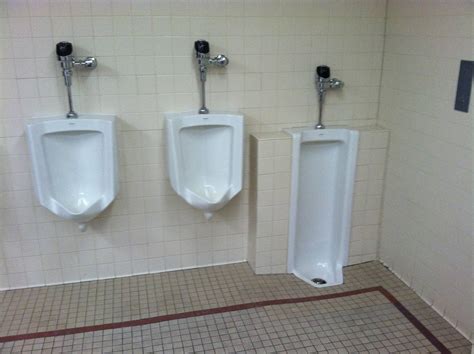 this bathroom has two types of urinals mildlyinteresting