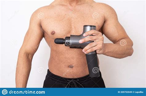 massage gun demonstration of use by man stock image image of legs