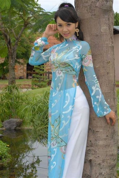 viet trinh in a gray ao dai ao dai fashion traditional asian dress
