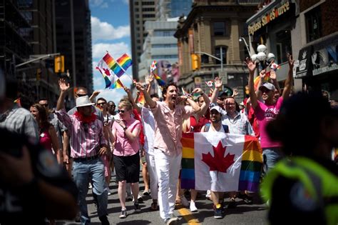 prime minister justin trudeau joins thousands marching in toronto s