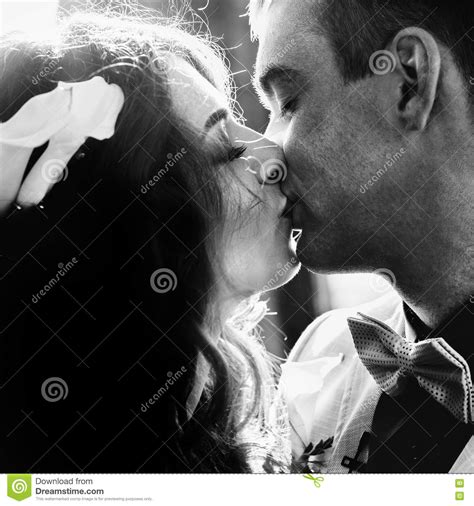 couple kisses in the sunshine stock image image of lifestyle groom
