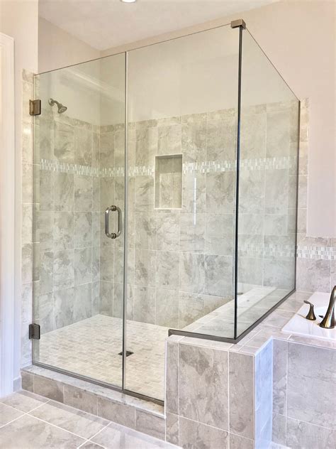 clear frameless shower  notched inline panel  return panel  kneewall installed