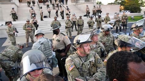tennessee national guard lays  shields  protesters request