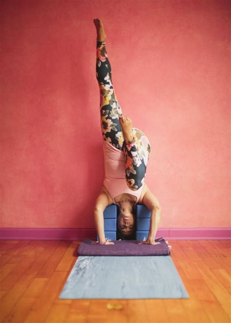 An Innovative Supported Headstand That Will Help You Overcome Your