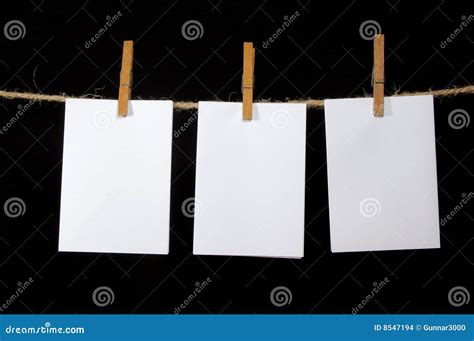 blank sheet  paper stock photo image  clothesline