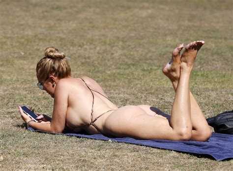 aisleyne horgan wallace covered nakedness on the beach 34