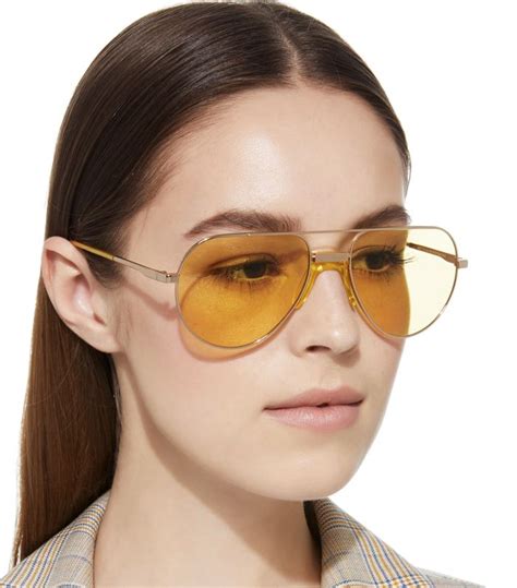 yellow lens sunglasses are trending—see the look here who what wear uk