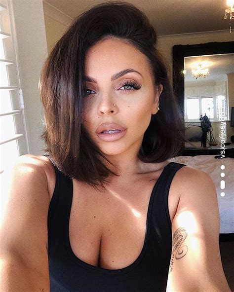 jesy nelson unleashes cleavage in plunging sports bra
