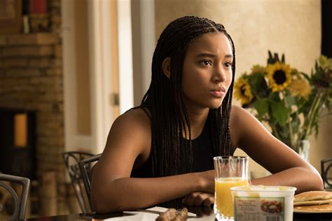 the hate u give amandla stenberg s starr is trapped between 2 worlds