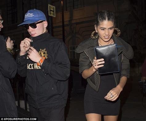 Rocco Ritchie Is In High Spirits As He And A Friend Attend London
