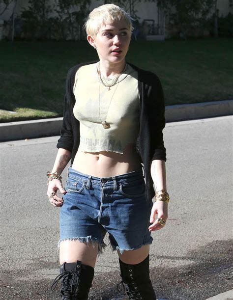 miley cyrus urges fans to masturbate daily with crude pic after posing