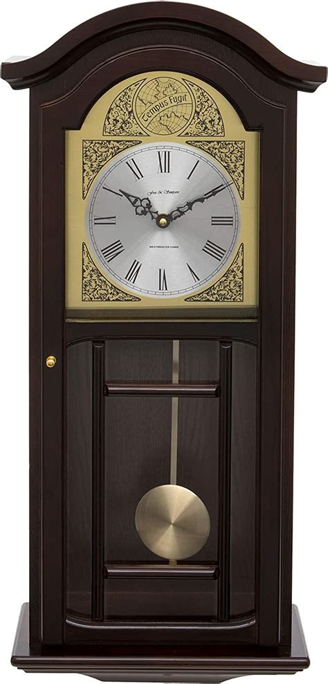 horloge murale pendule en bois de couleur acajou fox  simpson avec carillons westminster