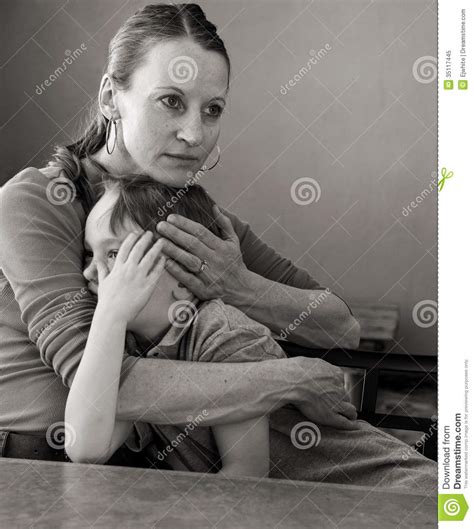 mother hugs crying son stock image image of unhappy