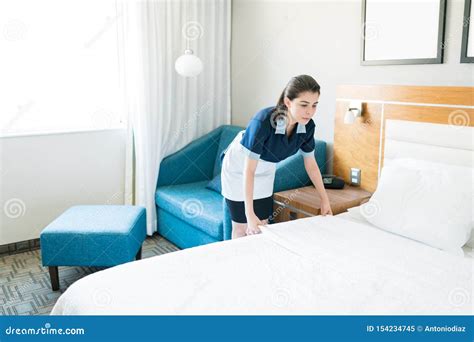 Latin Maid Making Bed In Hotel Room Stock Image Image Of Room