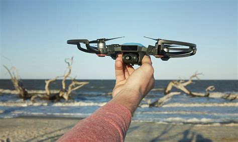 dji unveils  spark drone controlled  hand gestures daily mail