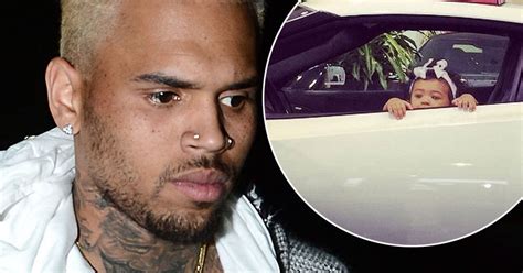 Chris Brown Shares Adorable Snap Of Daughter Royalty Peeking Out Of A