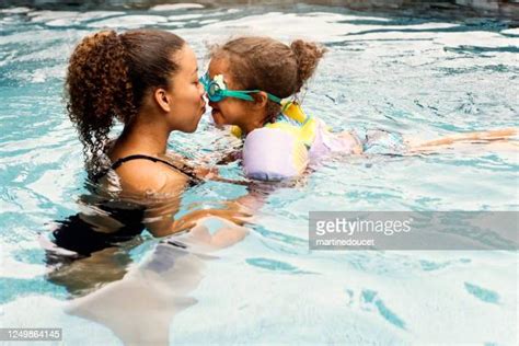 Girls Kissing In Pool Bildbanksfoton Och Bilder Getty Images
