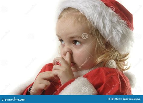 santa helper picking  nose stock photo image