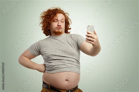 Funny Overweight Plump Man With Duck Lips Wearing Undersize T Shirt