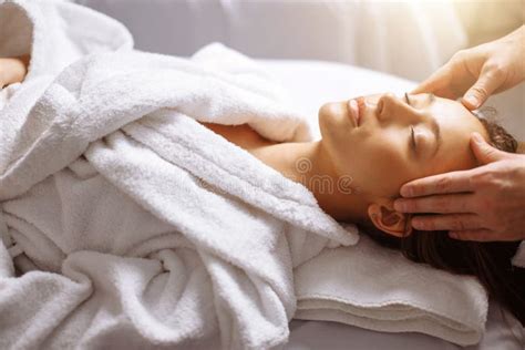 Girl Having Spa Facial Massage In Luxurious Beauty Salon Stock Image