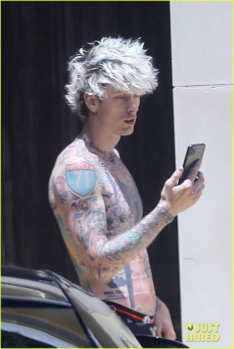 Machine Gun Kelly Shows Off His Tattoos Shirtless While
