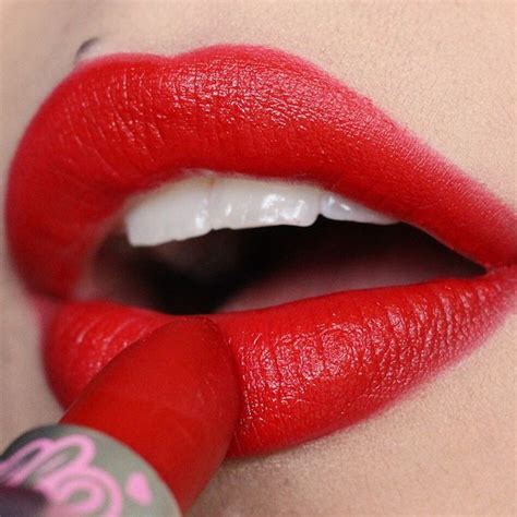 bright red lips lipstick color nurse by sugarpill with