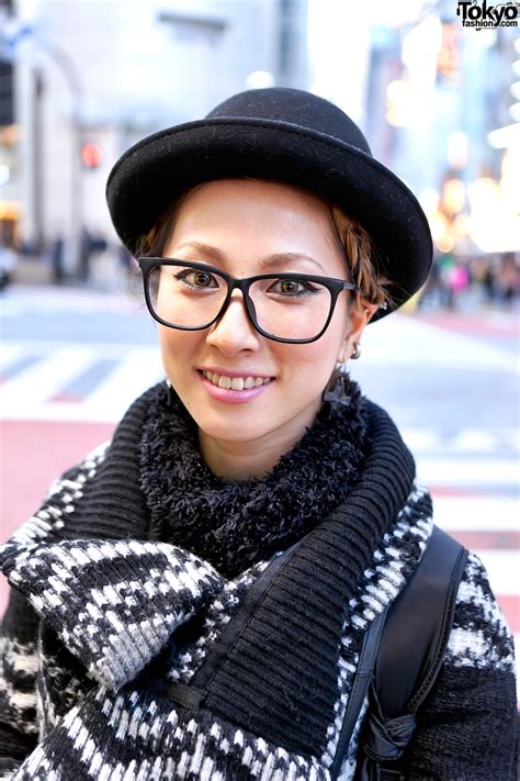 shibuya girl in glasses bowler hat long knit sweater and boots