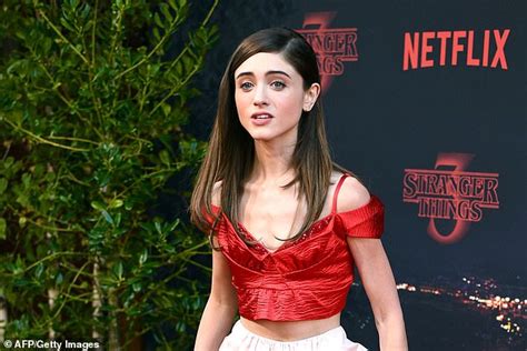 stranger things natalia dyer poses with charlie heaton at the show s