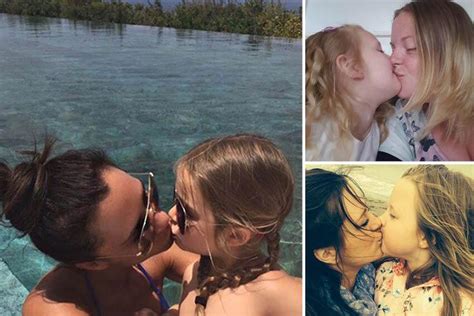 victoria beckham trolled for snap of her kissing daughter harper on the lips… but mums are