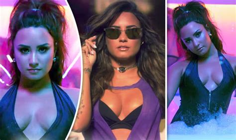Demi Lovato Flaunts Extreme Cleavage As She Shows Off Sexy Curves