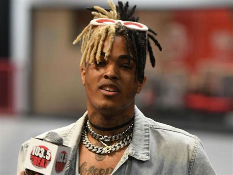 xxxtentacion slain rapper  turbulent life informed  brutal