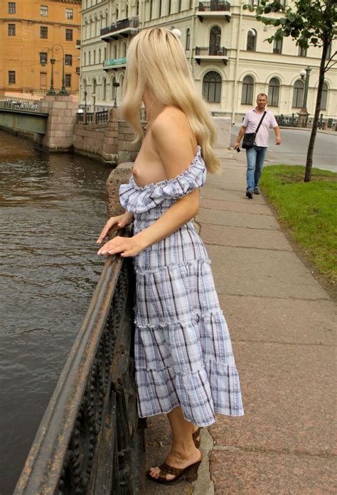 blonde in a gray dress with hairy pussy walks at the streets russian sexy girls