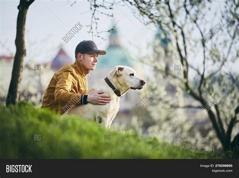 young man  dog pet image photo  trial bigstock