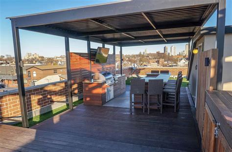 rooftop deck  outdoor kitchen  tv denver roof decks pergolas  outdoor living spaces