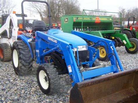 holland tcd  compact tractor  loader lot