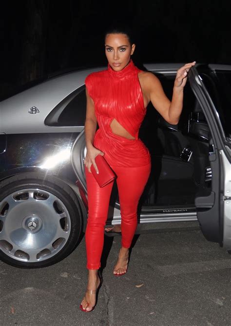 kim kardashian oozes sex appeal in red hot leather outfit that clings