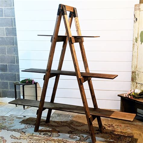 wood ladder display shelf  wedding shop