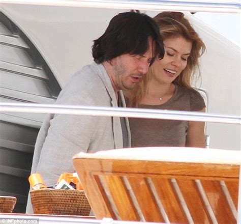 Living The Good Life A Fuller Faced Keanu Reeves Indulges In Champagne