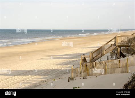 wooden beach access stairway  sand dune  deserted beach