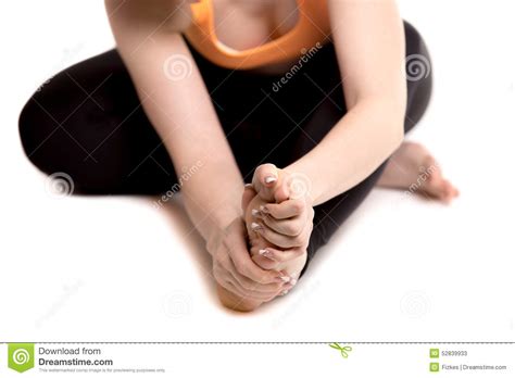 Female Athlete Holding Sore Foot Close Up Of Female Legs