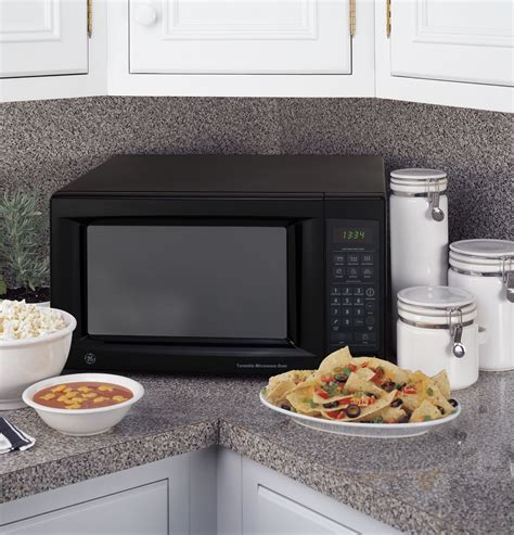 General Electric Jes1334bh 1 3 Cu Ft Capacity Countertop Microwave