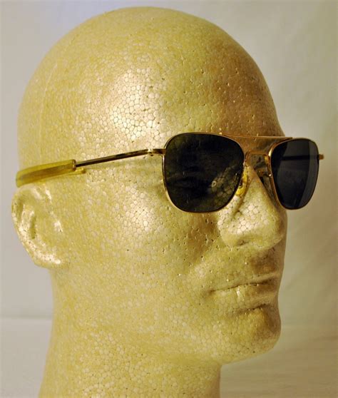 vintage 70s aviator sunglasses gold metal frames straight side