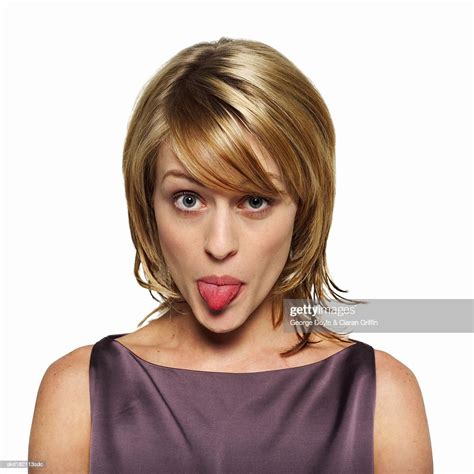 Portrait Of Young Woman Sticking Tongue Out Photo Getty Images