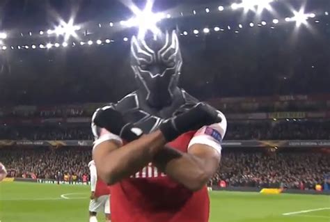 arsenal fc striker pierre emerick aubameyang celebrates  goal   black panther mask