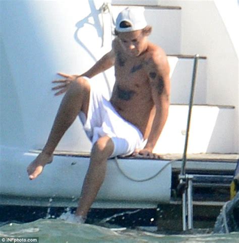 harry styles kicks back in his grey y fronts with topless