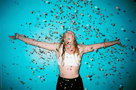 confetti against blue backdrop with teenager girls by wendy laurel