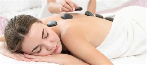hot stone massage what is it how can it help you massage experts