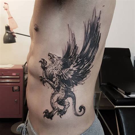 Pin By Claire On Tattoo Ideas Griffin Tattoo Tattoos Sparrow Tattoo