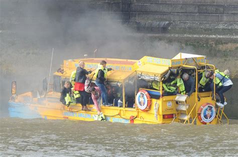 fire breaks out on duck boat as passengers jump into